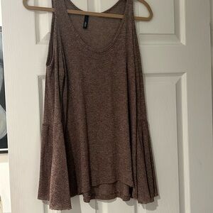 Cold shoulder blouse with bell sleeve detail.